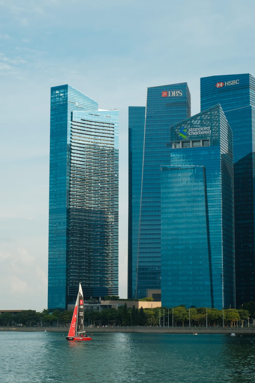 skyscrapers and sailboats in modern cityscape